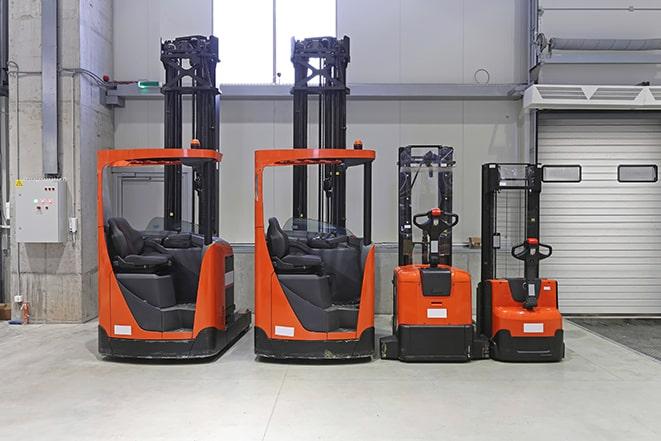 forklift equipment organized in a row